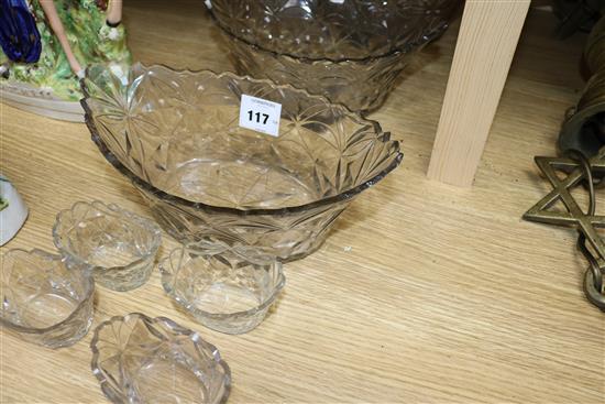 A part suite of late Georgian cut glass bowls and salts, bowls 11in.